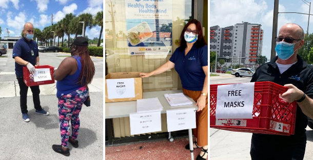 staff distributing face masks