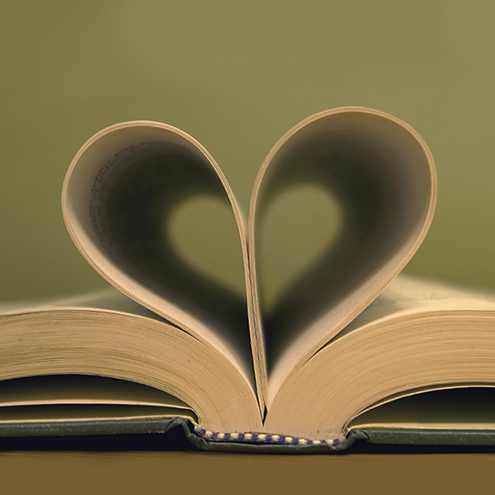 Pages of a book curled into a heart shape