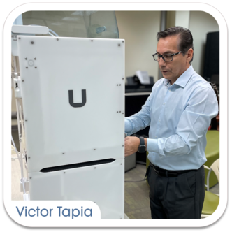 Victor Tapia fixing an Ultimaker 3D Printer