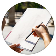 Person drawing in the park