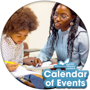 Tutor pointing to a notepad while explaining a concept to a student