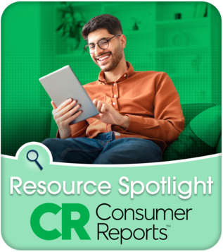 Man reading iPad on couch