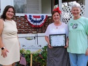The ECO Division and Green Gables in front of house