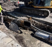 broken iron sewer pipe
