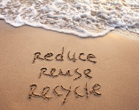 reduce, reuse, recycle written in sand