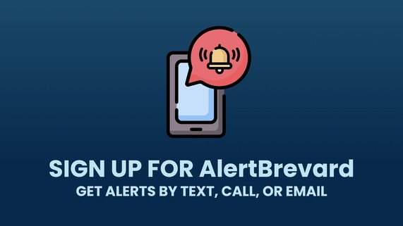 Phone with an alert displayed. Includes text that says, "Sign Up for Alert Brevard. Get alerts by text, call or email."