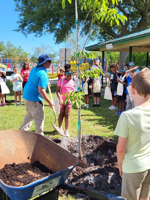tree planting ceremony with students