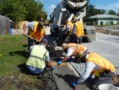 Streets crew working on paving road