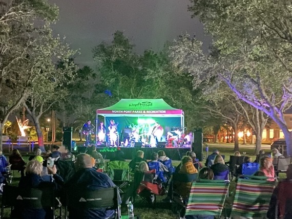 Long distance view of stage of concert in the park