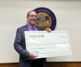 5k check presented to Mayor Sortal for sidewalk imporvements