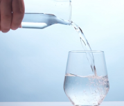 water being poured into a cup