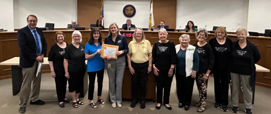 Plantation Women's Club presents checks