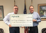PGIT presents check to Mayor Sortal