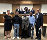 Jayden and Jovaun Stevens receiving proclamation for perfect attendance 2026