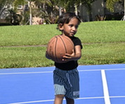 kid with basketball