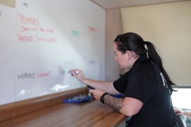 Officer Laura Bobitz performing the information-gathering role during a recent monthly Crisis Negotiation Unit training.