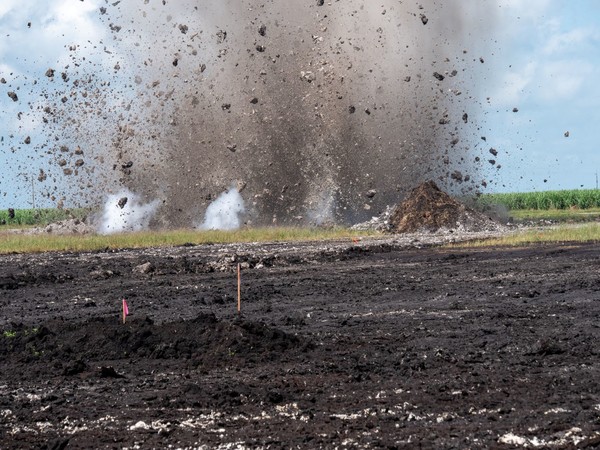 blasting rock into air