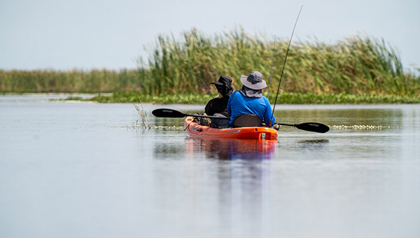kayaking with fishing poles at A1 FEB