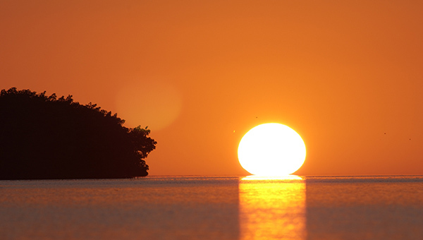 sunset over waterbody