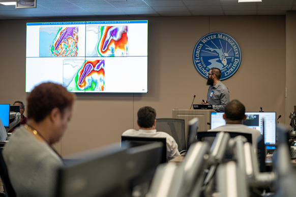 District staff providing a weather update