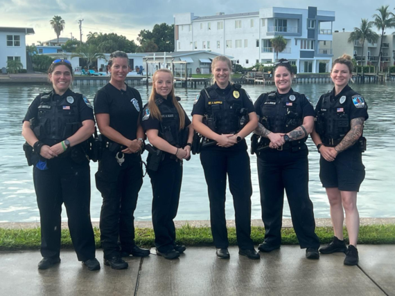 Treasure Island Police Department women officers pose for a picture on the waterfront