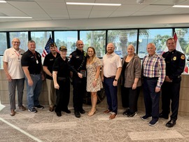 TIFR firefighter/paramedic Adam Dooger poses with award
