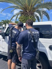Treasure Island Fire Rescue Crews safing dog locked in car