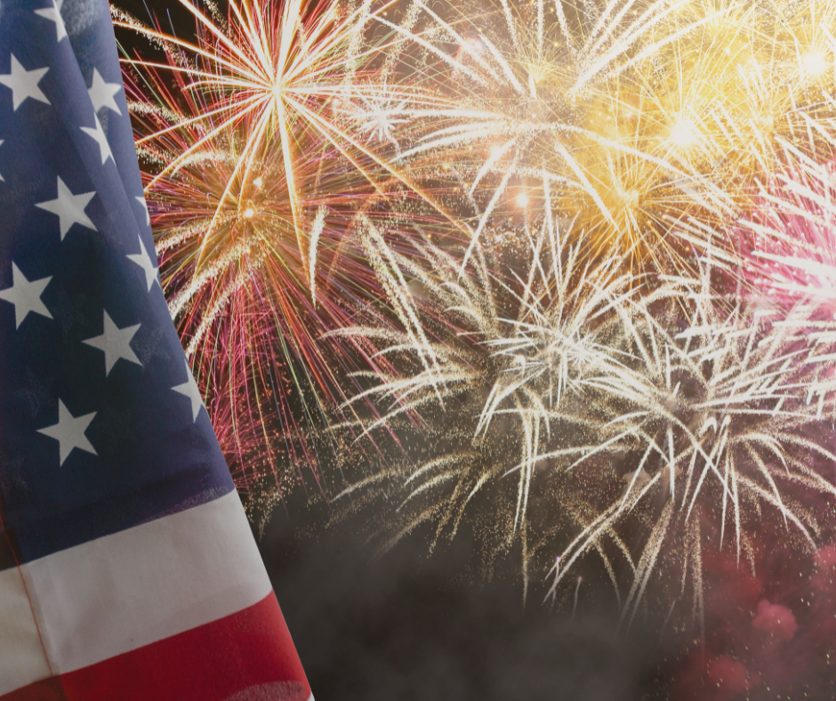 American flag with fireworks in background