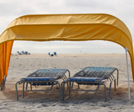 Cabana with two loungers on Treasure Island Beach