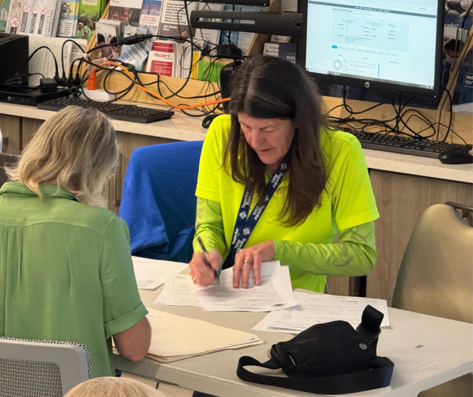 Permit tech Renee helping a resident with permit application