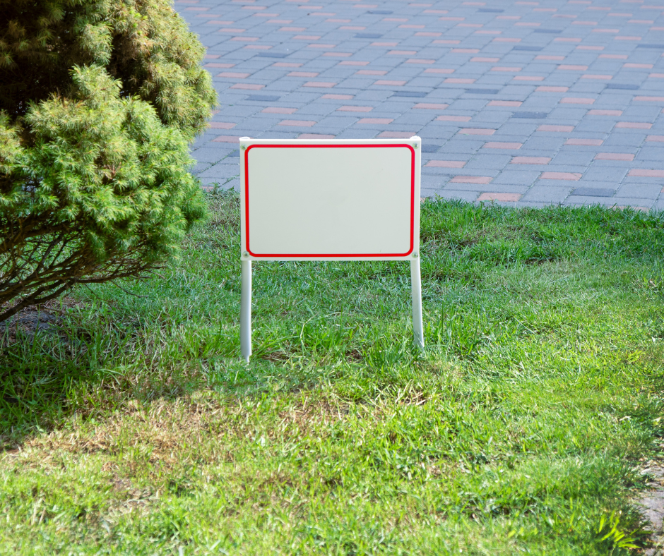 Yard sign in yard