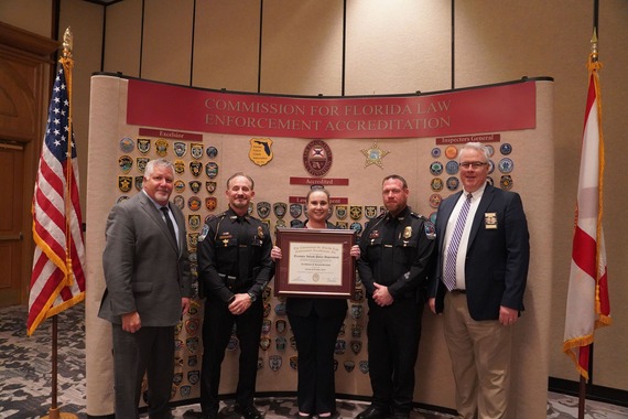 Treasure Island Police Department personnel receiving accreditation award