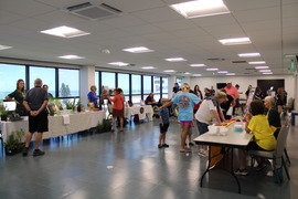 Table vendors set up on fifth floor of City Hall