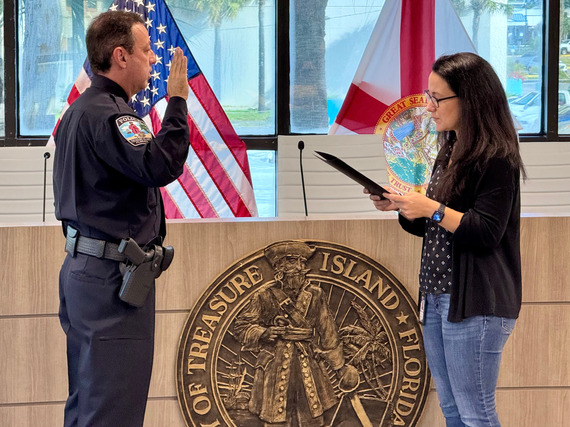 Treasure Island Police Officer Nascimento being sworn in
