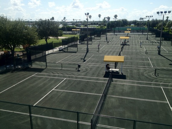 Aerial view of tennis courts at Treasure Bay Gold and Tennis