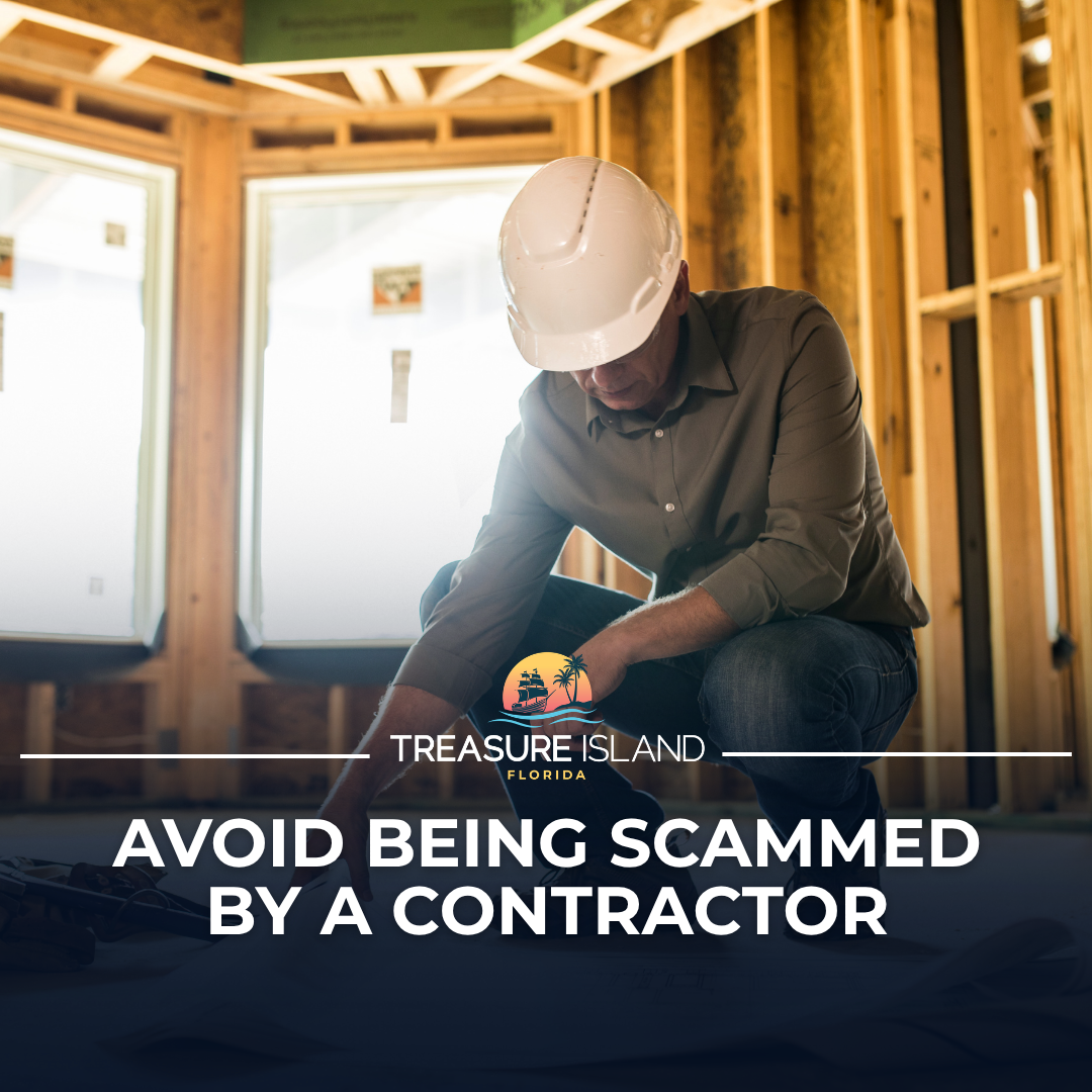 Contractor working on plans with text overlay of Avoid Being Scammed By a Contractor