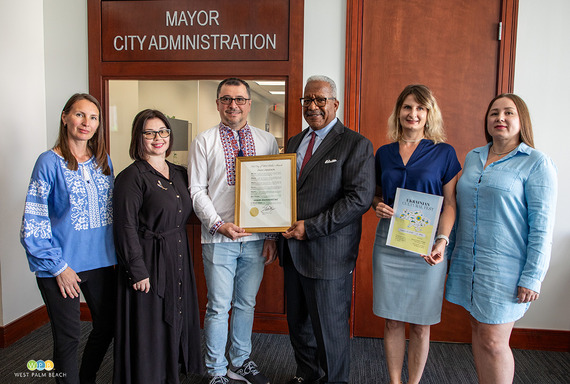 Mayor Keith A. James presents Proclamation to Dmytro Bozhko, president Ukraine Association of Florida, and members - a