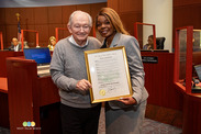 Father Frank O'Loughlin and City Commissioner Shalonda Warren - a