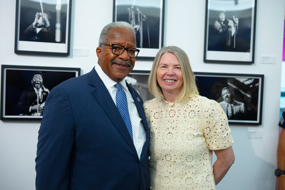 Jazz in Unexpected Places Exhibit Opening Mayor James and another posing for photo