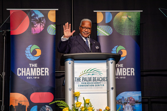 Mayor James waves to the crowd while getting a warm welcome - a