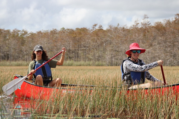 Visit Grassy Waters Preserve, two people kayaking 