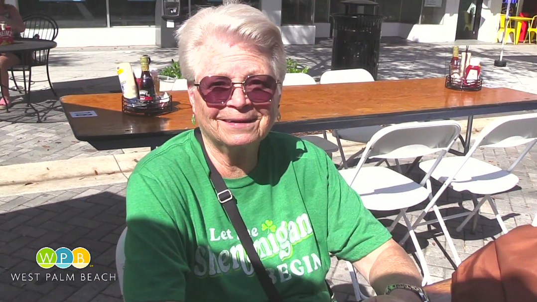 Woman Smiling in Green Shirt 