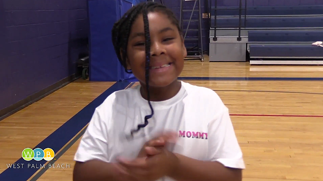 Little Girl Smiling, mid clapping 