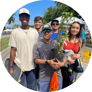 Group of individuals holding plant icon