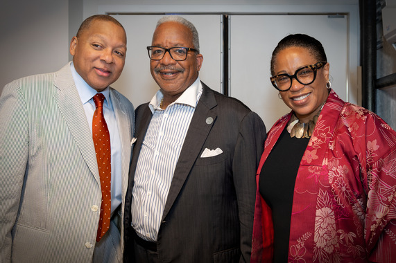 3 people smile for the camera, one is Mayor James