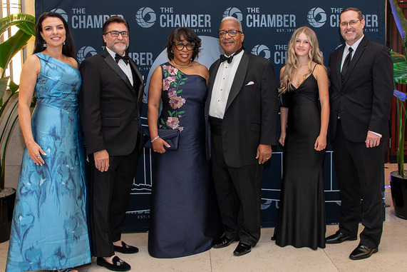 Group shot of 6 people wearing gala or cocktail attire Mayor and Mrs. James with Michael Davis and, left side, and James Johnson and - a