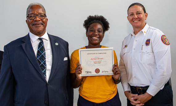 Jordan Brown with Mayor Keith A. James and Chief Diana Matty - a