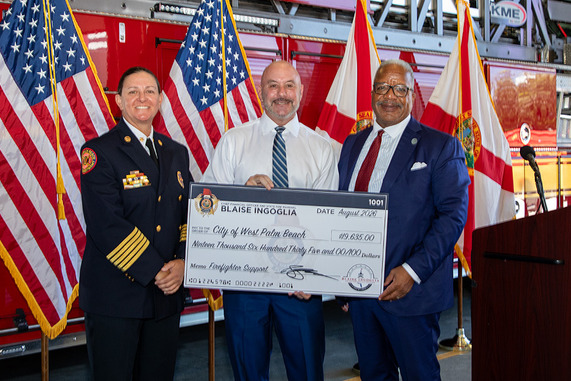 Chief Diana Matty and Mayor Keith A. James accept check from Florida CFO Blaise Ingoglia 