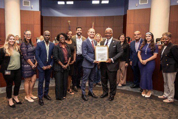 Mayor Keith A. James and CRA team during proclamation.