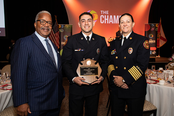 WPB Firefighter of the Year Nicholas Harmueller with Mayor Keith A. James and Chief Diana Matty October 2026